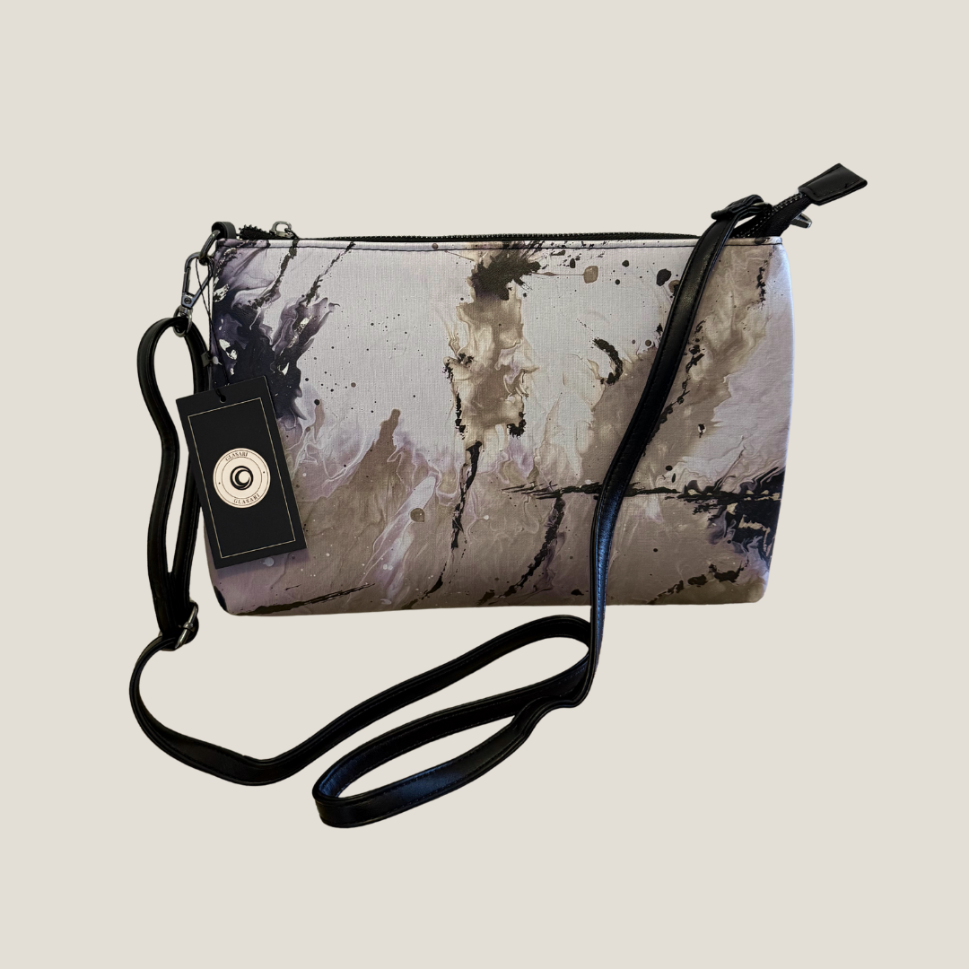 GLASARI Art Cross-Body Bag in Sand Earth, an original abstract artwork in grey, taupe and black, with black adjustable strap