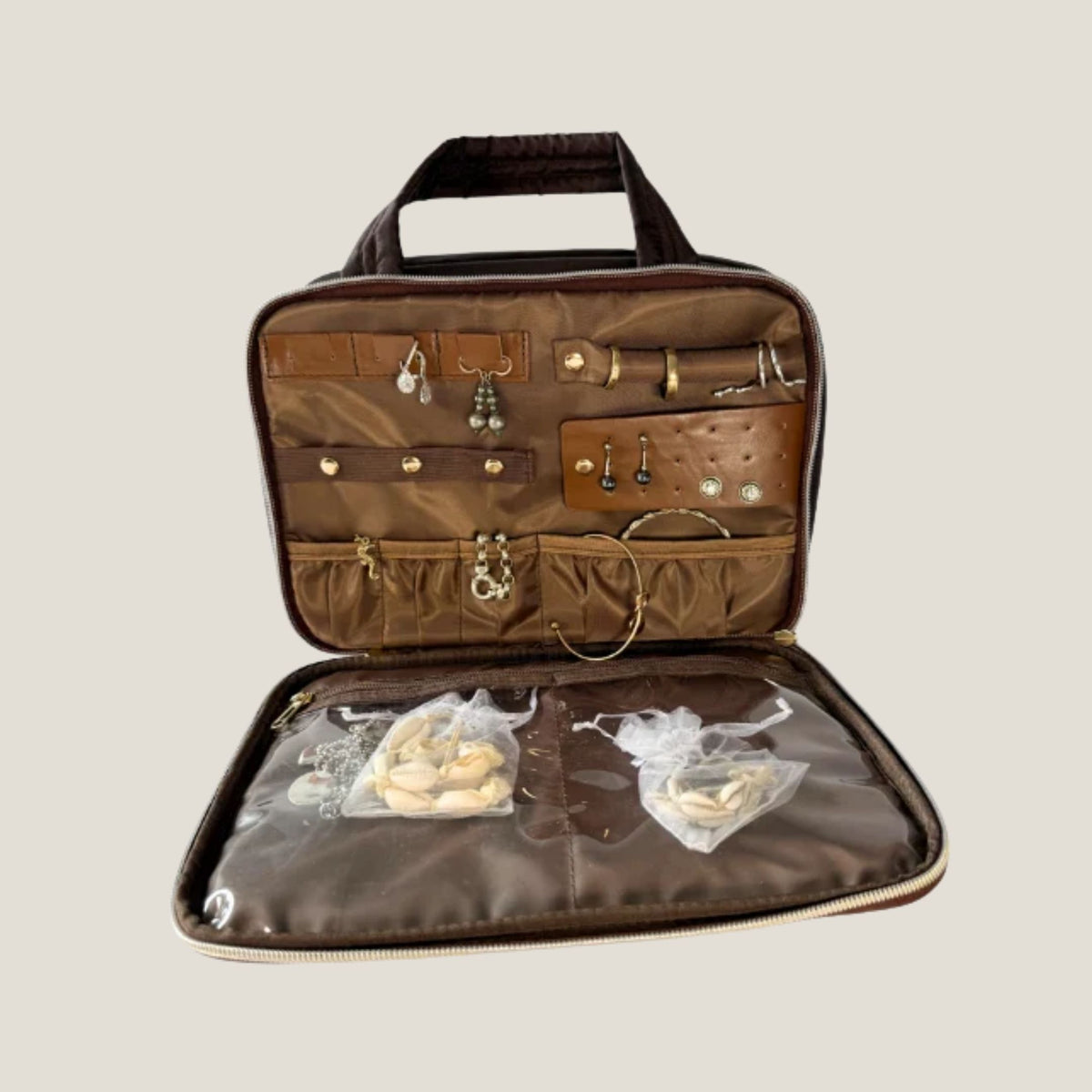GLASARI On-The-Glow Cosmetic Case in Cocoa Drift, open to show the jewellery compartments, earring holders and clear zip pockets